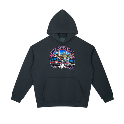 We Move DC Pullover Hoodie — navy heavyweight brushed fleece with the DC transit badge printed on left chest and full back, featuring the Washington skyline, Metro train, and bus.